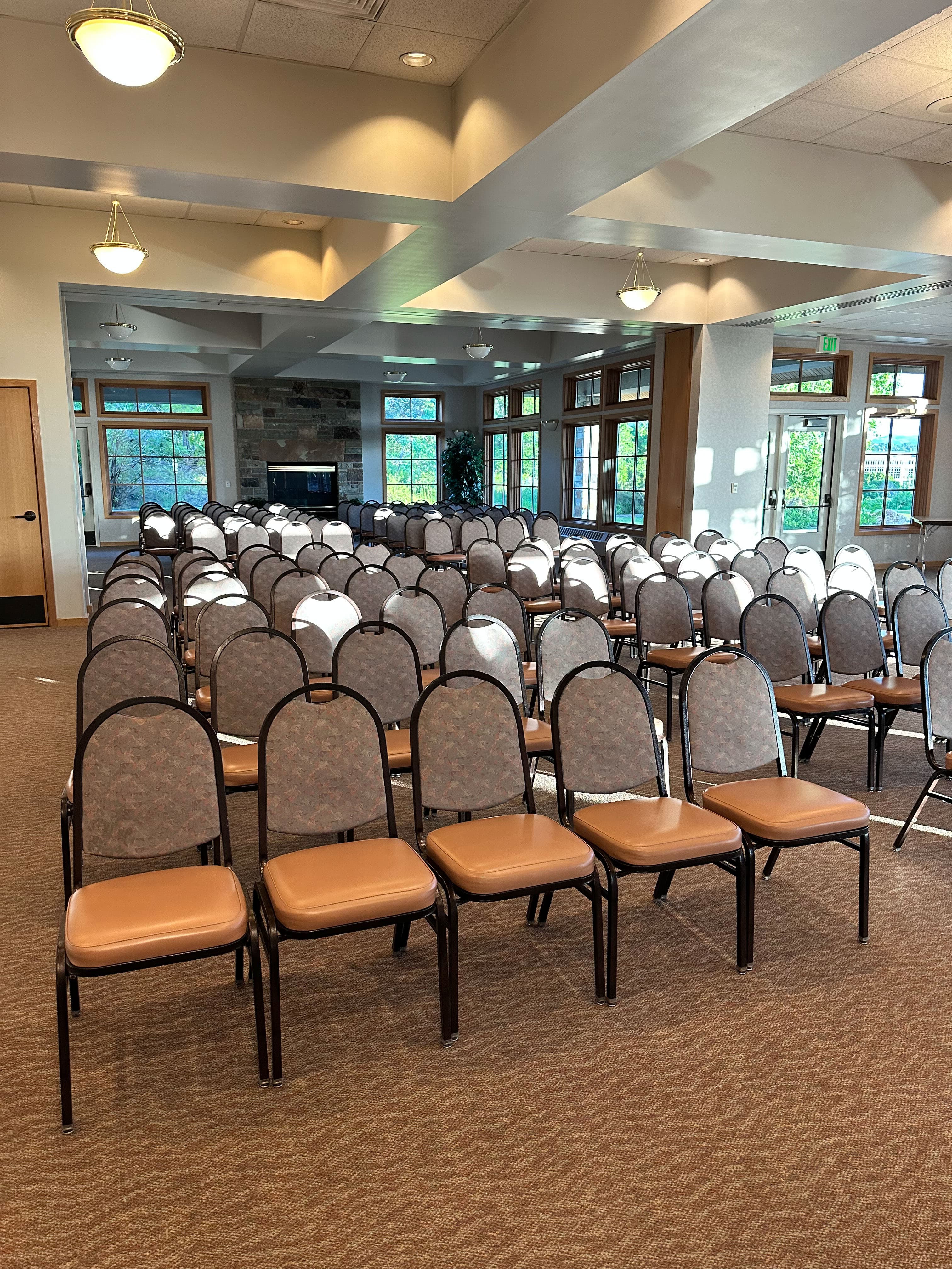 Graduation party setup with seating and AV equipment at Old Mill Banquet Hall